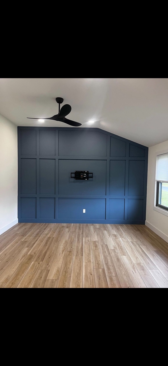 Finished blue paneled accent wall